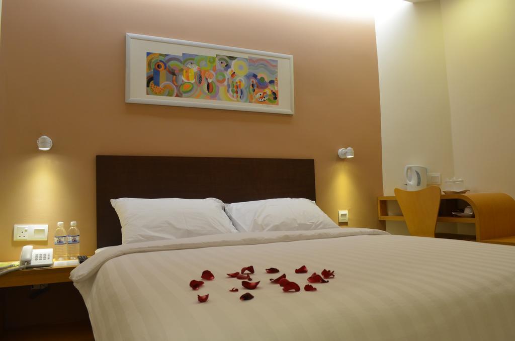 קואה Hotel Asia חדר תמונה