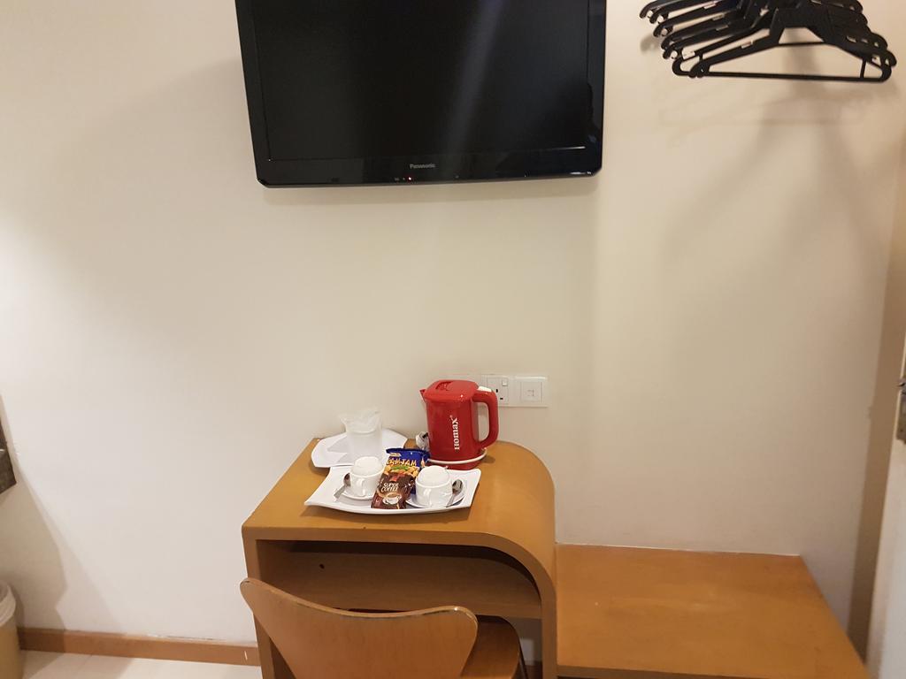 קואה Hotel Asia חדר תמונה