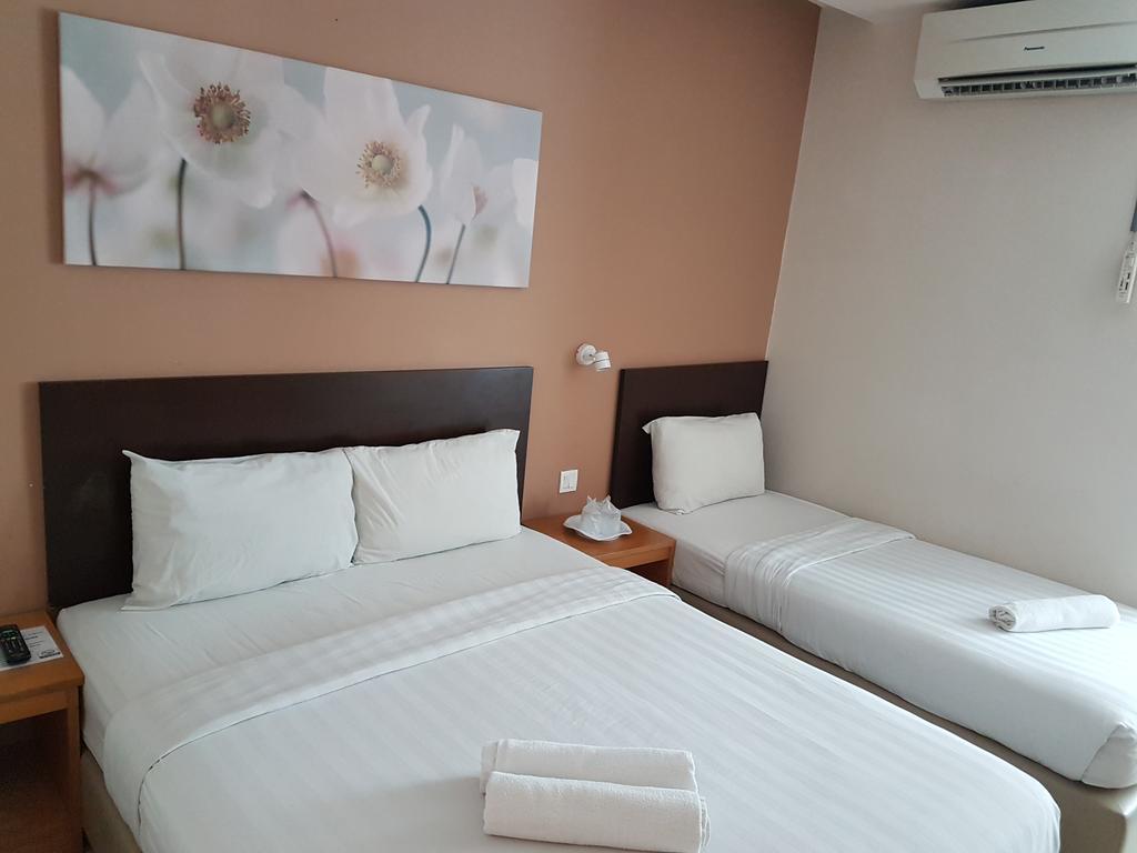 קואה Hotel Asia חדר תמונה